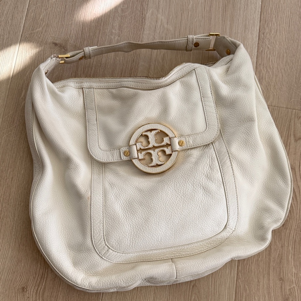 Tory Burch cream Leather Hobo with Gold Logo.